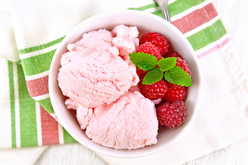 Image showing Ice cream crimson in bowl on board top