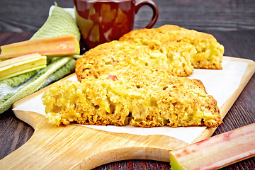 Image showing Scones with rhubarb on dark board