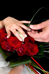 Image showing Hands over wedding bouquet