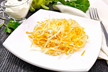 Image showing Salad of carrot and kohlrabi on dark board