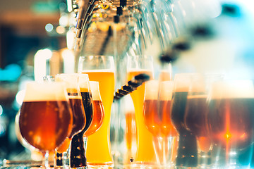 Image showing Beer taps in a pub