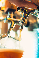 Image showing Beer taps in a pub