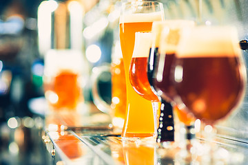 Image showing Beer taps in a pub