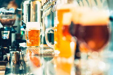 Image showing Beer taps in a pub