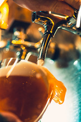 Image showing Beer taps in a pub