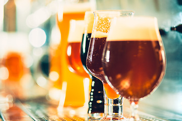 Image showing Beer taps in a pub