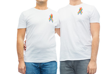 Image showing close up of couple with gay pride rainbow ribbons