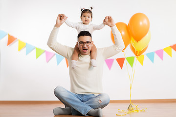 Image showing father and daughter with birthday party balloons