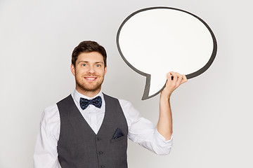 Image showing happy man in suit holding blank text bubble banner