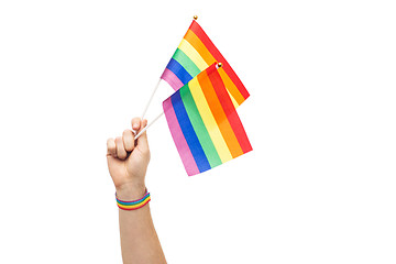 Image showing hand with gay pride rainbow flags and wristband