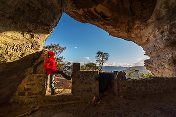 Image showing Female looking out from cave Blue Mountains Australia