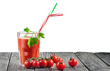 Image showing Cherry tomatoes with glass of tomato juice
