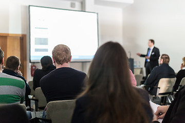 Image showing Business speaker giving a talk at business conference event.