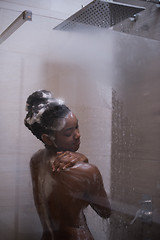 Image showing African American woman in the shower