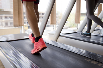 Image showing sportsman exercise jogging on treadmill