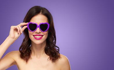 Image showing woman with pink lipstick and heart shaped shades