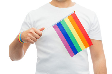 Image showing man with gay pride rainbow flag and wristband