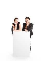 Image showing Businesswomen with billboard