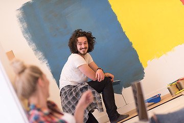 Image showing Happy couple doing home renovations