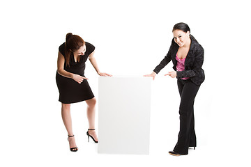 Image showing Businesswomen with billboard