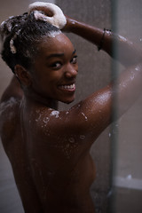 Image showing African American woman in the shower