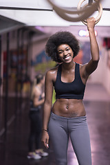 Image showing black woman doing dipping exercise