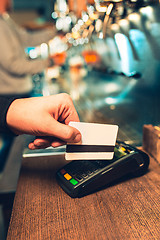 Image showing Man using payment terminal