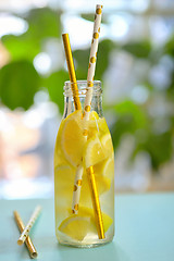 Image showing Bottle of water and lemon