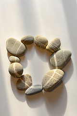 Image showing pebble stones circle on white