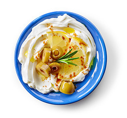 Image showing fresh cream cheese with olives and lemon