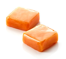 Image showing caramel candies on white background