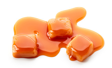 Image showing caramel candies and sauce