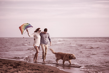 Image showing happy couple enjoying time together at beach