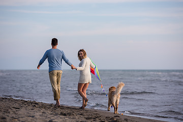 Image showing happy couple enjoying time together at beach