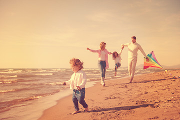 Image showing happy family enjoying vecation during autumn day