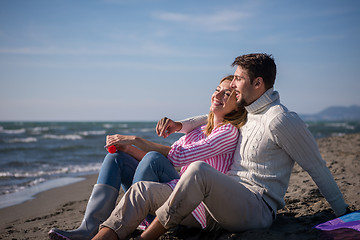 Image showing young couple enjoying time together at beach