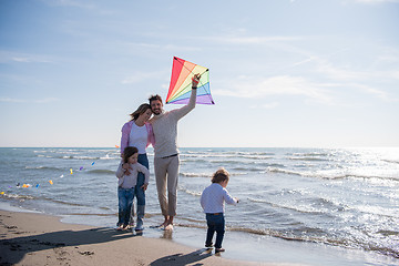 Image showing happy family enjoying vecation during autumn day