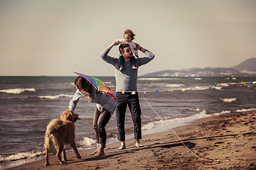 Image showing happy young family enjoying vecation during autumn day