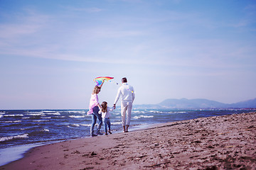 Image showing happy family enjoying vecation during autumn day