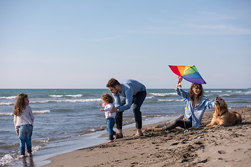 Image showing happy young family enjoying vecation during autumn day