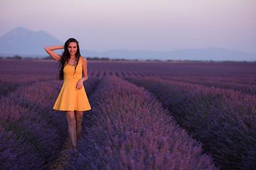 Image showing woman in yellow dress at lavender field