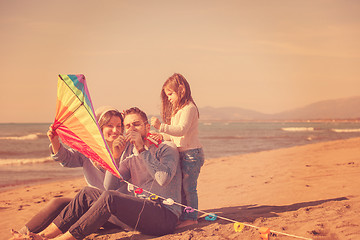 Image showing happy family enjoying vecation during autumn day