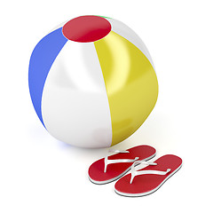 Image showing Beach ball and flip-flops