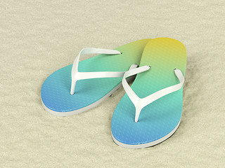 Image showing Flip flops on sand