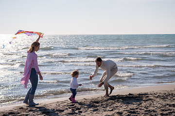 Image showing happy family enjoying vecation during autumn day