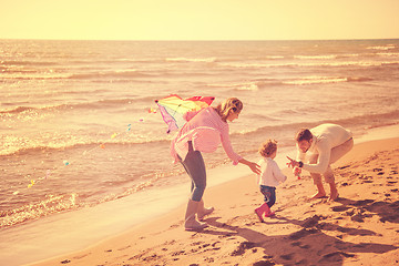 Image showing happy family enjoying vecation during autumn day