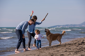 Image showing happy young family enjoying vecation during autumn day