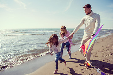 Image showing happy family enjoying vecation during autumn day