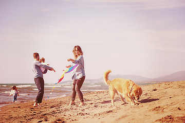 Image showing happy young family enjoying vecation during autumn day