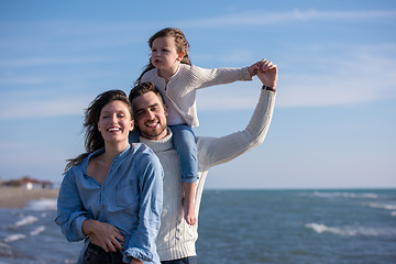 Image showing Young family enjoying vecation during autumn